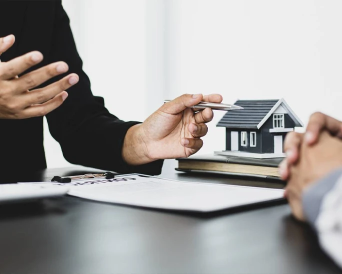 Investment advisor providing guidance on property investment linked to residency or business plans.